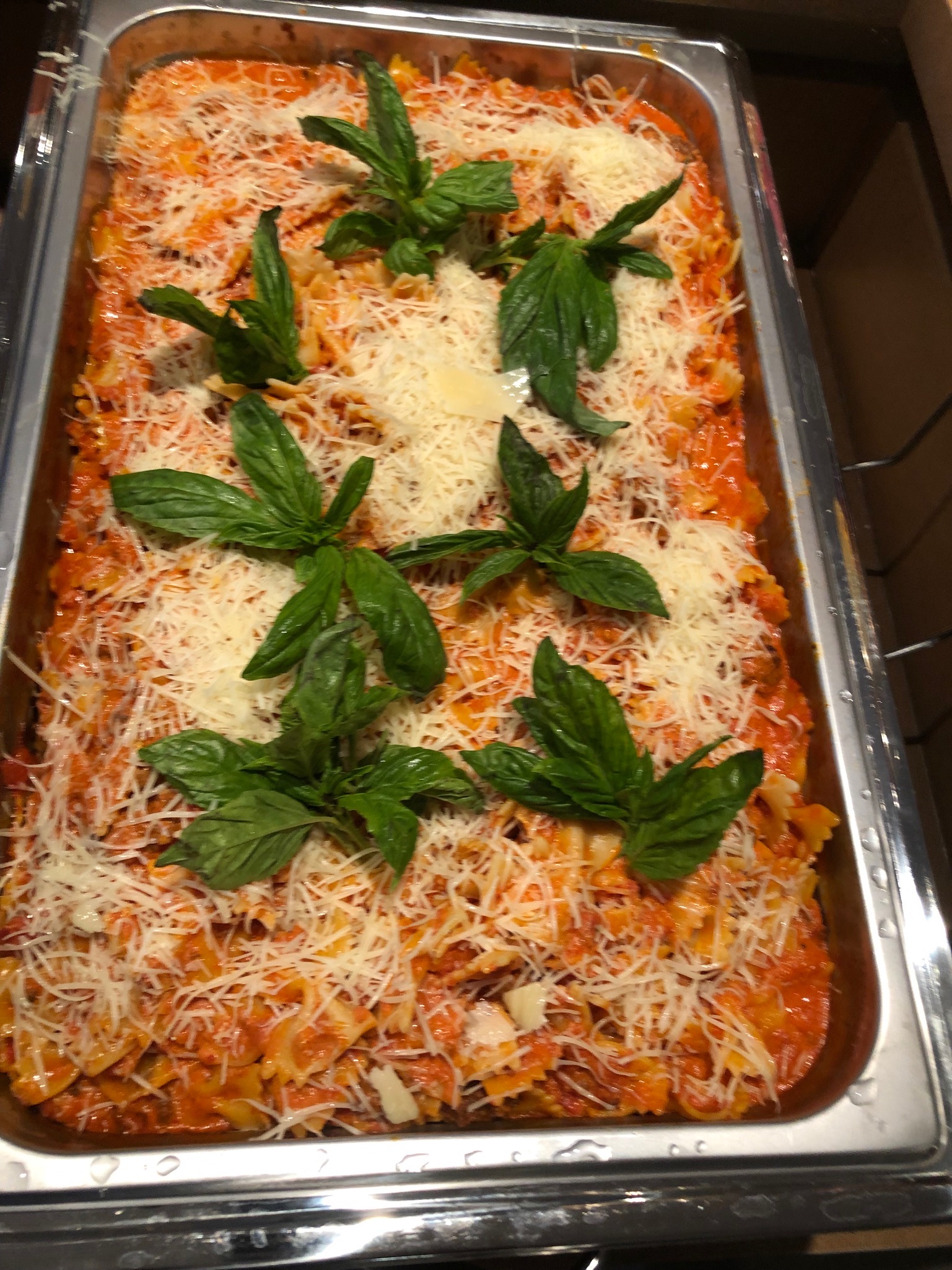 Farfalle pasta with vodka sauce, pecorino, and Parmigiano-Reggiano